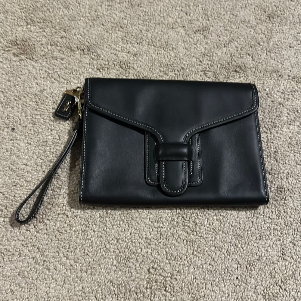 Coach NWOT black leather clutch